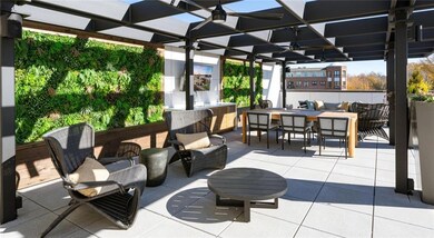 View of patio with a pergola and outdoor dining space