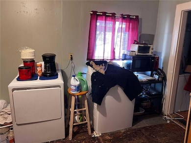 Clothes washing area with washer / dryer