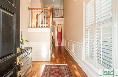 Foyer entry with view of 2 story ceilings and stai