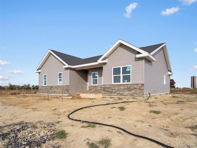 View of front of property featuring stone siding
