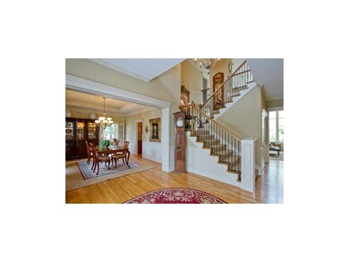 Grand entrance, soaring ceilings, split staircase,