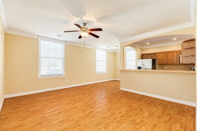 Breakfast bar and kitchen open to the living area.