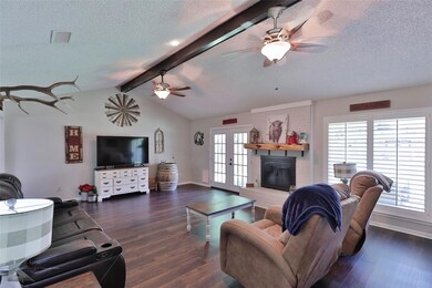 Living room featuring dark hardwood / wood-style f