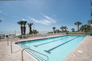 View of swimming pool featuring a patio area and a