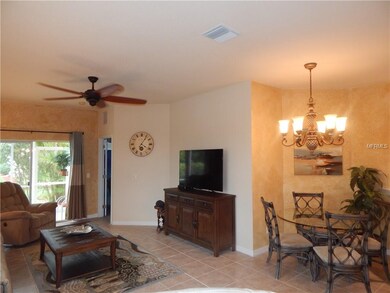 Living room, dining area, screen lanai in view, ma
