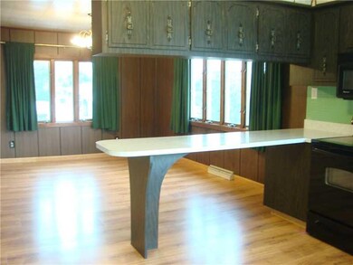 Kitchen. The kitchen is wide open to the dining ro
