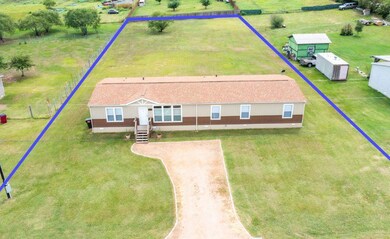 Aerial view of property and surrounding area feat