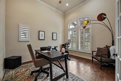 Overlooking your landscaped front lawn is the executive study that makes it easy to work from home.