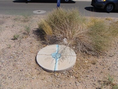 AT PROPERTY LINE