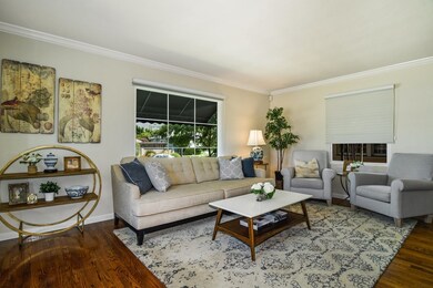 Spacious and light filled living room features har