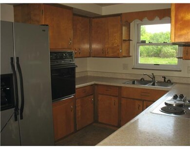 Kitchen. U shaprd kitchen gives you ample storage.