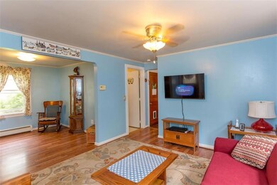View of living room, office, full...