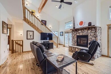 Beautiful stone fireplace and hardwood floors!