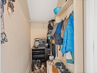 Spacious closet featuring hardwood / wood-style flooring