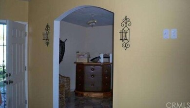 Kitchen partially open to living room