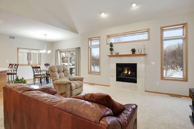 Living room with gas burning fireplace and lots of