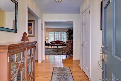 Foyer entrance with hardwood flooring