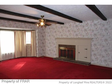 Family room has fireplace 2