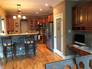 INVITING KITCHEN W/LARGE PANTRY AND DESK AREA. OPE