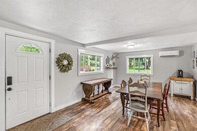 Entry on Main, Open living concept, Dining Room, Kitchen, Living area.