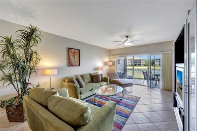 Living room featuring a ceiling fan