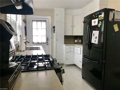 Lots of cabinets for storage ... doors leads out t