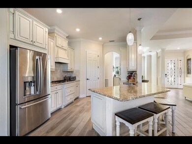Stunning kitchen offering breakfast island and nea