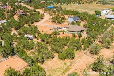 7-Lot Extends Behind Small Trailer