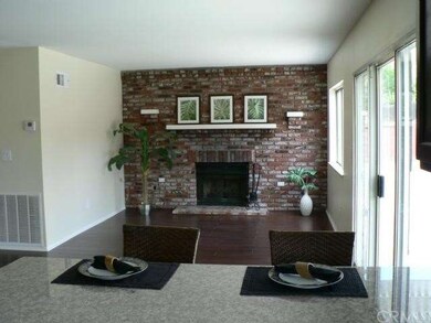 Family room off the Kitchen featuring a warm brick