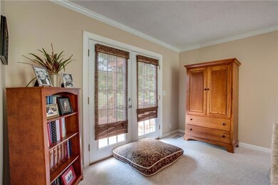 Patio doors leading to oversized deck from the great room.