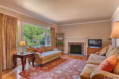Inviting Living Room with Finished Hardwood Floori