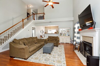 The open floor plan provides the perfect setting to work in the kitchen while the kids hang out on the sofa’s.  Cozy up in front of the fireplace during the winter months.