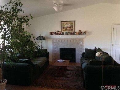 Fireplace with mantel and tile surround