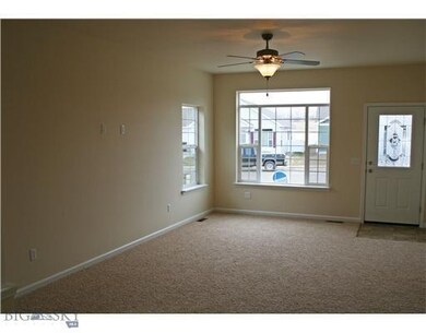 Living room. Photo of similar home.