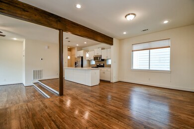 Modern feel with large kitchen island , hardwood b