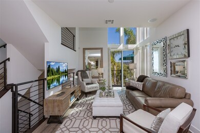 Living Room with High ceilings and expansive windo
