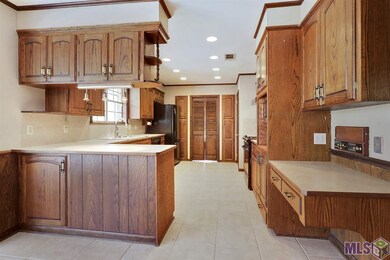 Please notice all the recessed lighting in this ki