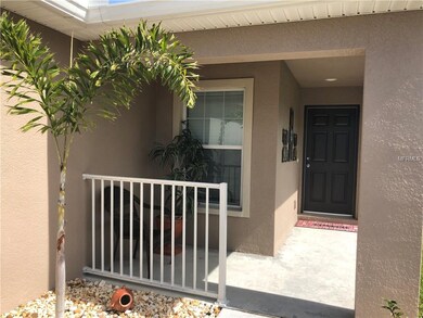Beautiful rocked front walk-way with a cover front
