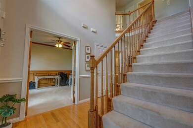 Foyer with Hardwood Floors - Office with French Do