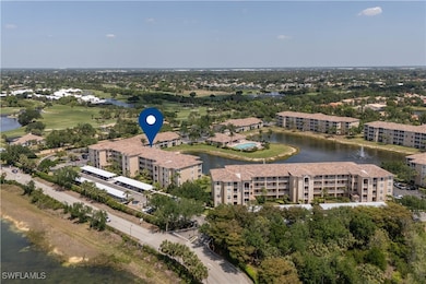 Birds eye view of property with view of golf cours