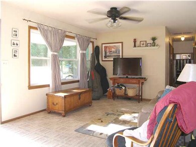 The view of the living room from the kitchen. Note
