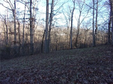 1994 2bed/2bath Manufactured Home and 1.51 acres.  Great Investment Property.  Weatherization completed Jan 2018.  Fridge, washer and dryer convey.  Newer Roof, ready to carpet and paint.  Double pane windows. Great view, corner lot, private.  Large 