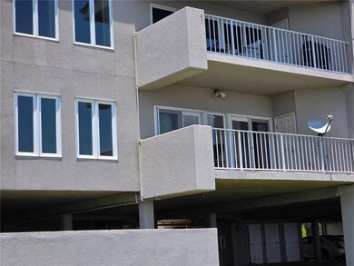 REAR EXTERIOR OF BALCONY WITH SATELLITE