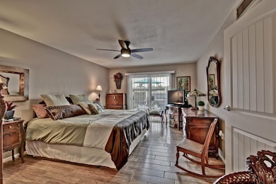 MASTER BEDRM W/DOOR TO FRONT PATIO