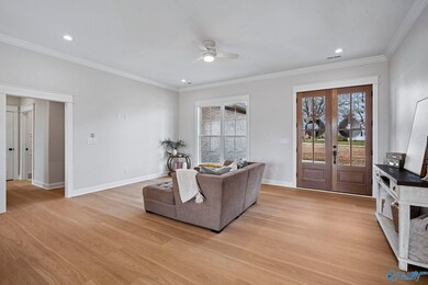 Cozy up in the expansive family room with soaring 10ft ceilings, recessed lighting. Ready to go w/CAT 6 wiring, perfect for modern living & entertainment!