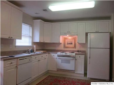 Loads of cabinets & counterspace in the kitchen