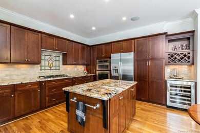 Lovely cabinetry and tile back splash.  Note the s