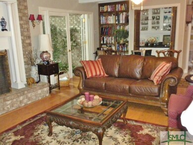 FORMAL LIVING ROOM WITH FIREPLACE & WETBAR