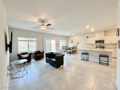 Living room with plenty of natural light, a ceilin