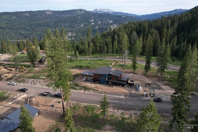 View of subject property with a mountainous background